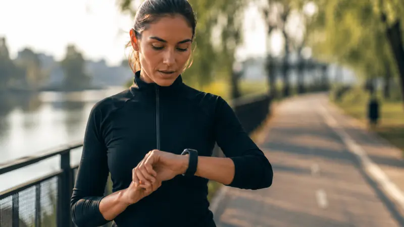 Woman checking her wearable tech